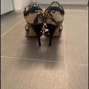 Snake skin heels never worn